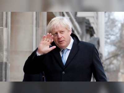 Boris Johnson cheers projected landslide Tory win in UK general election