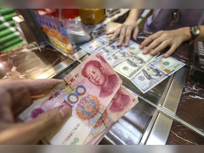 China’s cut of US dollar weighting in key index will boost global fortunes of yuan, economists say