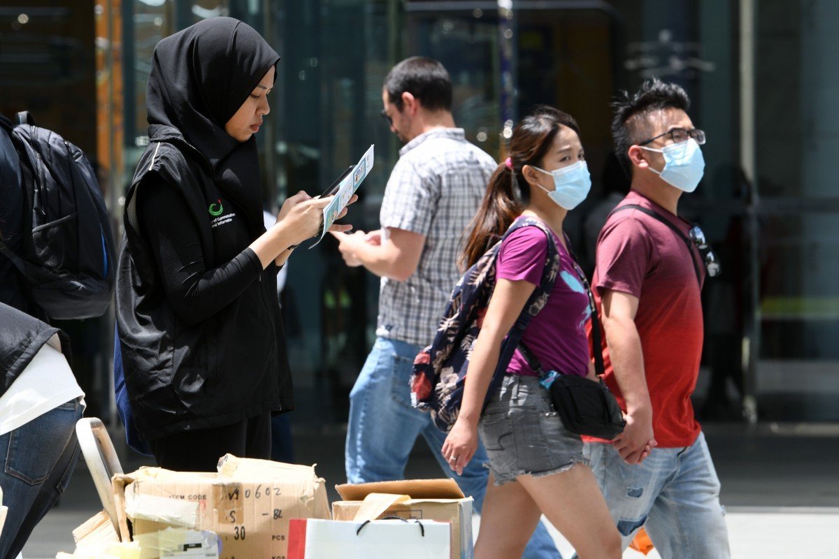 Coronavirus: Singapore raises outbreak alert level after signs of community spread