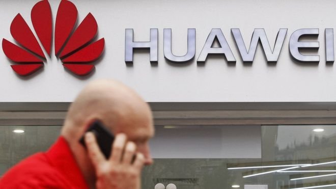 Huawei: Government wins vote after backbench rebellion