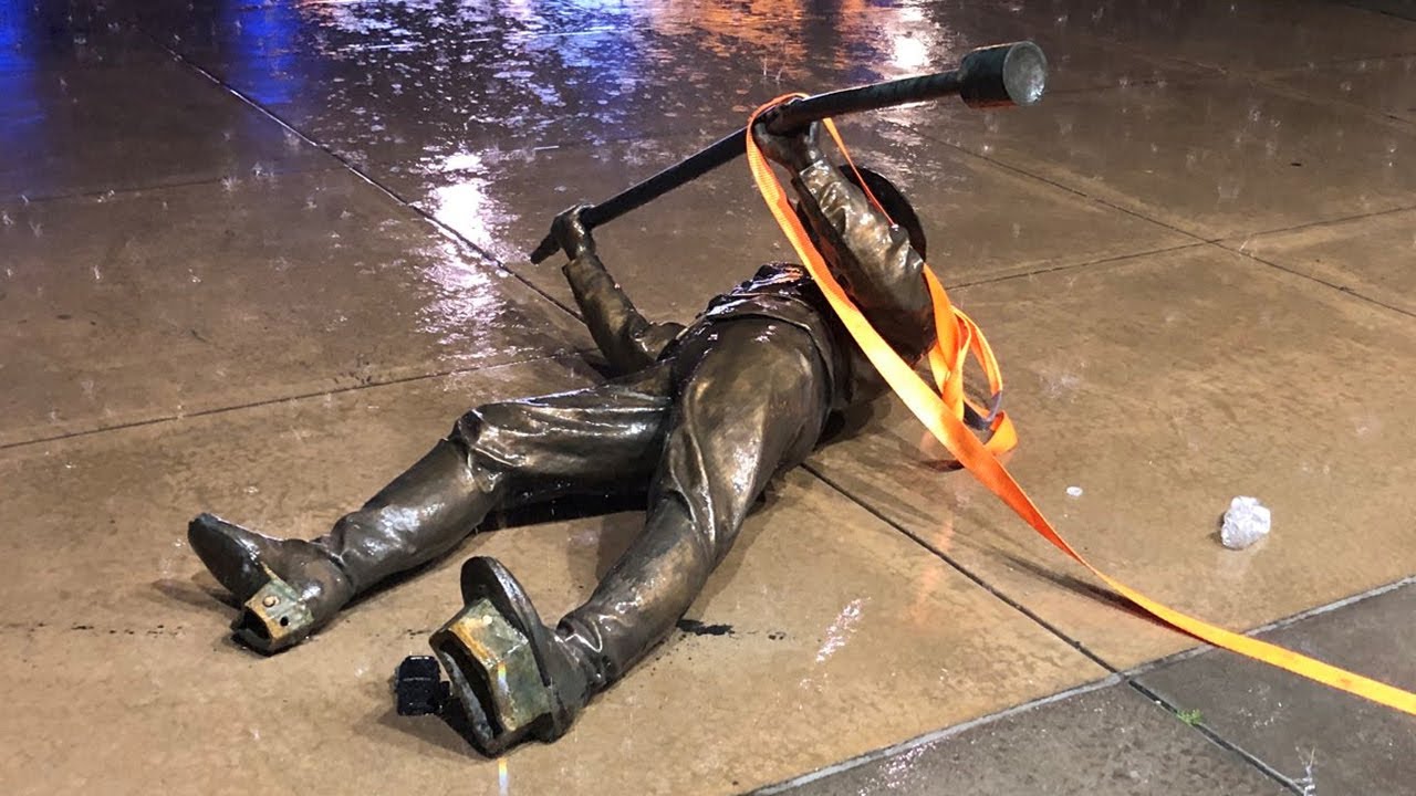 North Carolina protesters tear down Confederate statue in Raleigh
