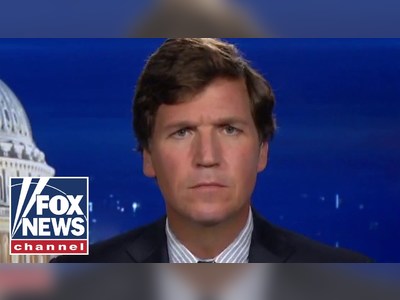 Tucker Carlson announces vacation after writer resigns over racist remarks