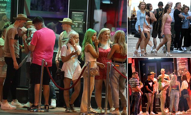 Drinkers pack into pubs and clubs after a day on beaches