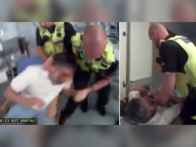 Grieving dad dragged from daughter's bedside by police