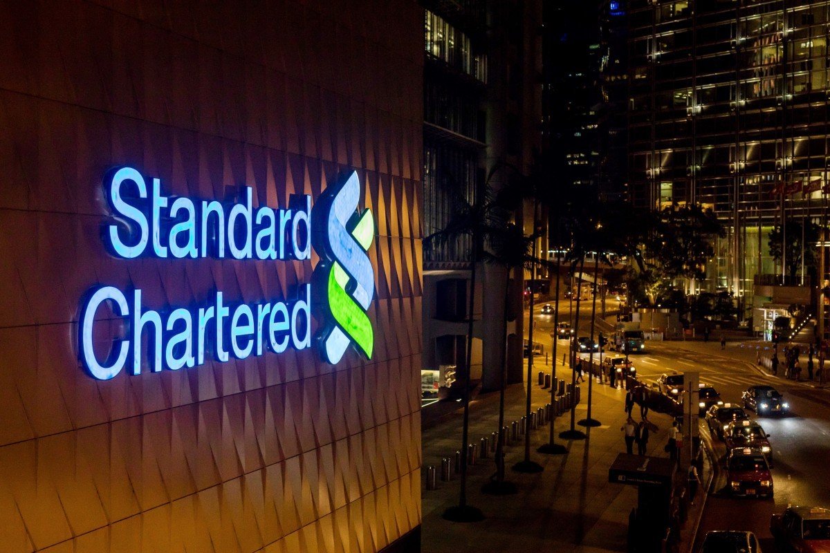 Standard Chartered to merge businesses, shrink some senior roles
