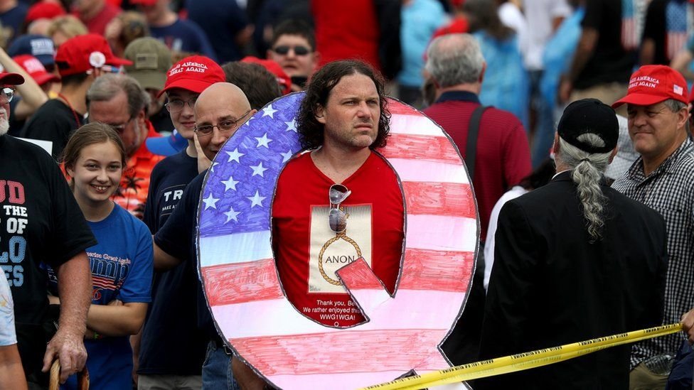 Conspiracy Theories, Such As QAnon, Appear To Gain Ground In Britain