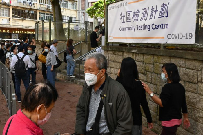 Hong Kong to give $700 to those testing positive for virus