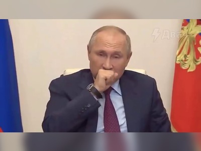 Russia's president Vladimir Putin was seen coughing heavily during a video conference call