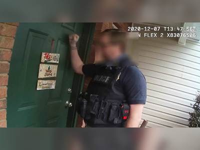 Police bodycam shows raid at Florida home of scientist who said she was fired over Covid data