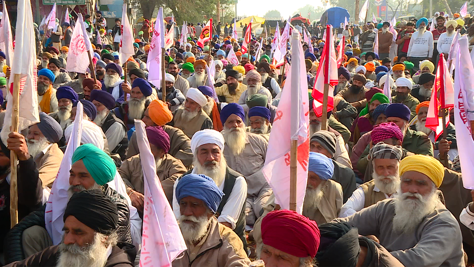 Indian farmers stand in defiance of new laws - 'we'll never leave the battlefield'