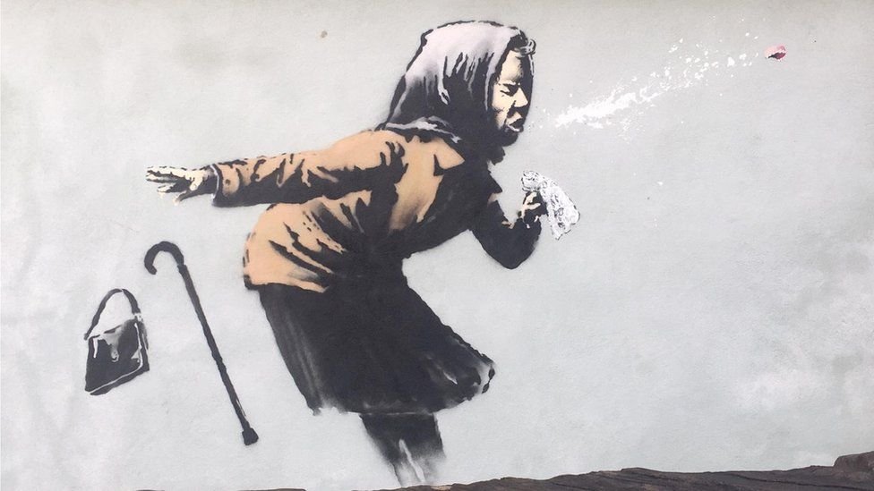 Banksy sneezing woman artwork appears on Bristol house