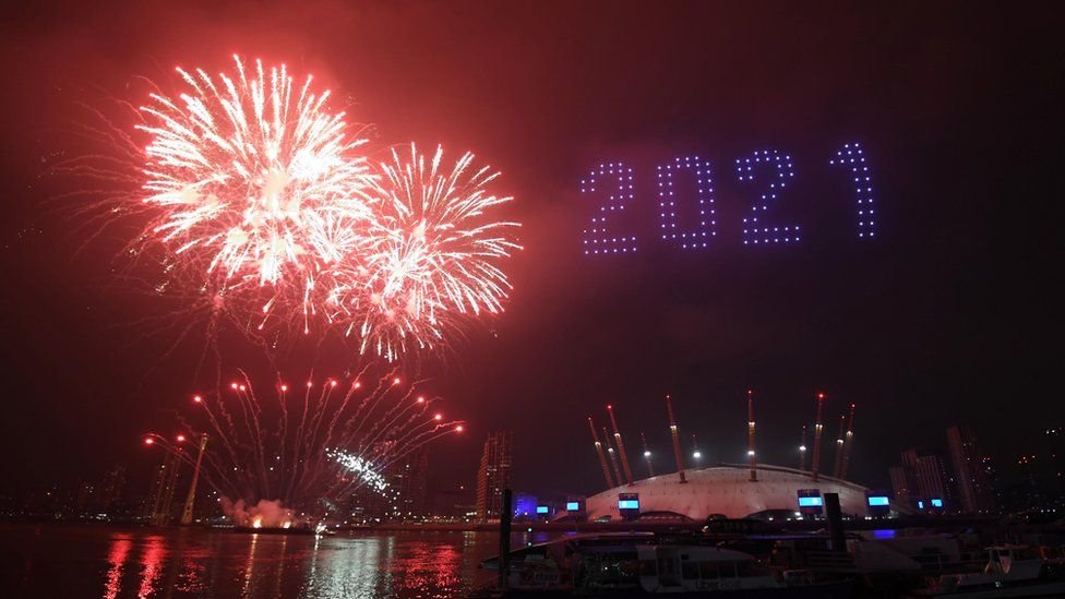 New Year's Eve: UK sees in 2021 with fireworks and light ...