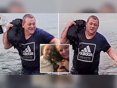 'Hero' dad jumps into frozen lake to save his dog