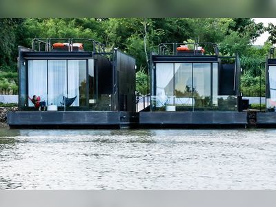 Floating Resort Units Draw Visitors To Thailand's Kwai River