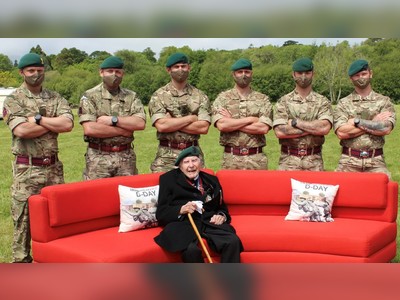 Wrong D-Day? British Army mocked after accidentally recreating porn meme with WWII veteran couch photo