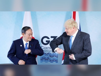 British PM Johnson backs Tokyo Olympics in talks with Suga
