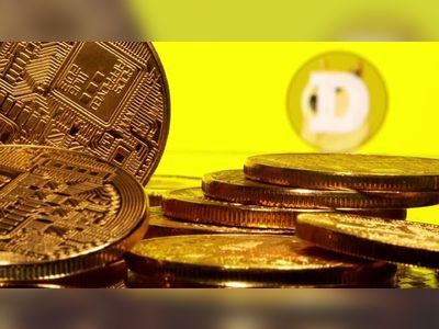 Dogecoin price jumps on news of Coinbase entry