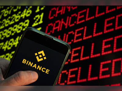 Crypto exchange Binance stops selling digital versions of stocks like Tesla and Apple as regulators circle
