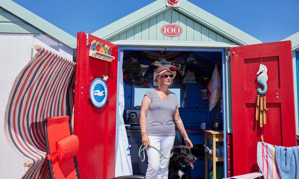 Sun, swimming, smoking and seagulls: a day in the life of beach hut Britain