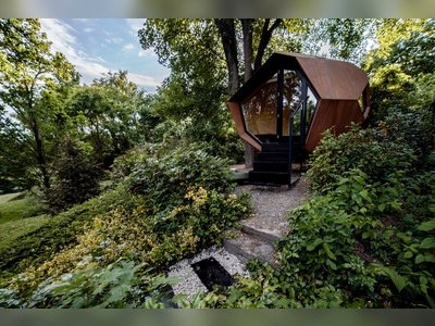 This Tiny Backyard Cabin Is Inspired by Space Capsule Design