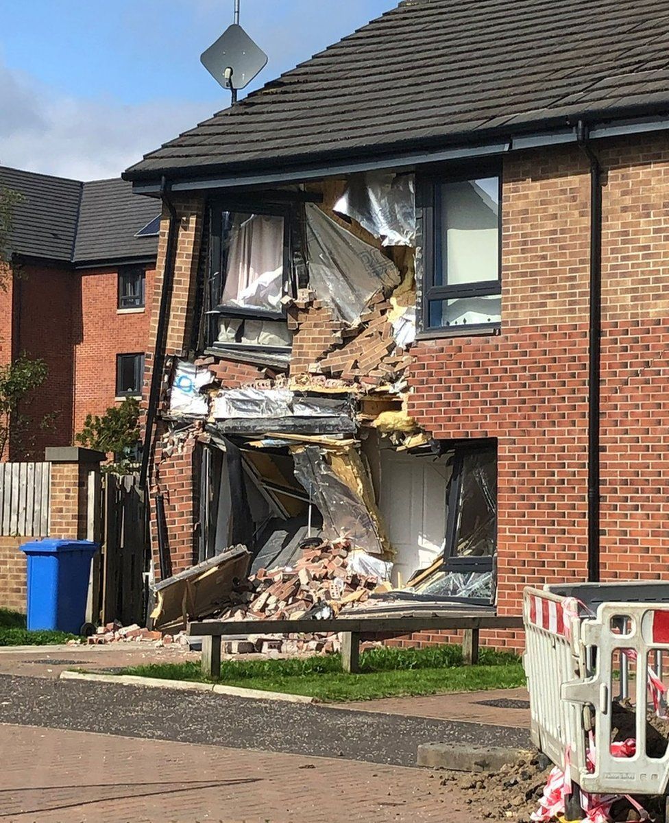 Man arrested after lorry crashes into house in East Kilbride
