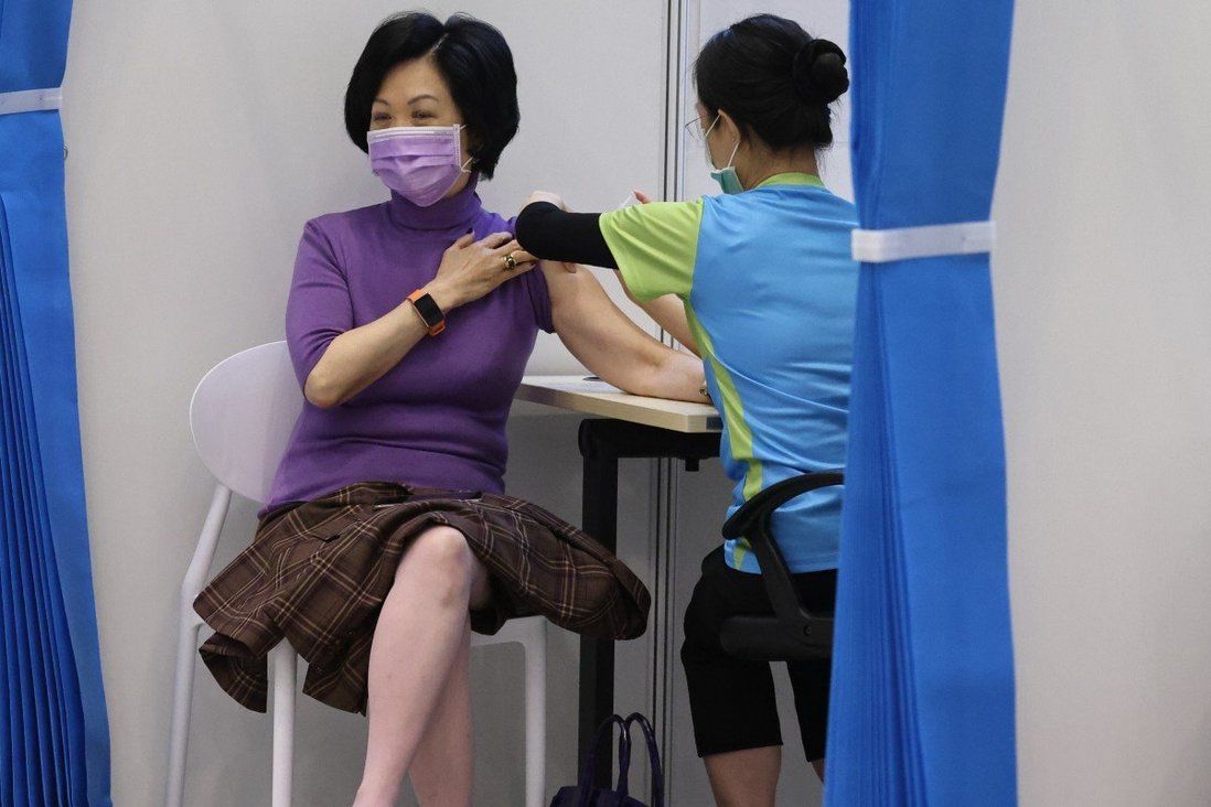 Top advisers to Hong Kong leader join study on third jab against Covid-19
