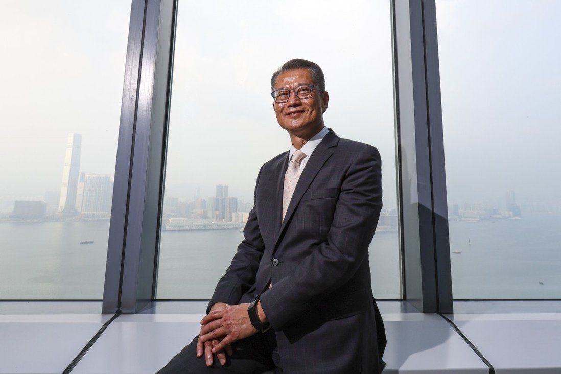 Hong Kong finance chief tight-lipped on top job ambitions, urges ‘healing as family’