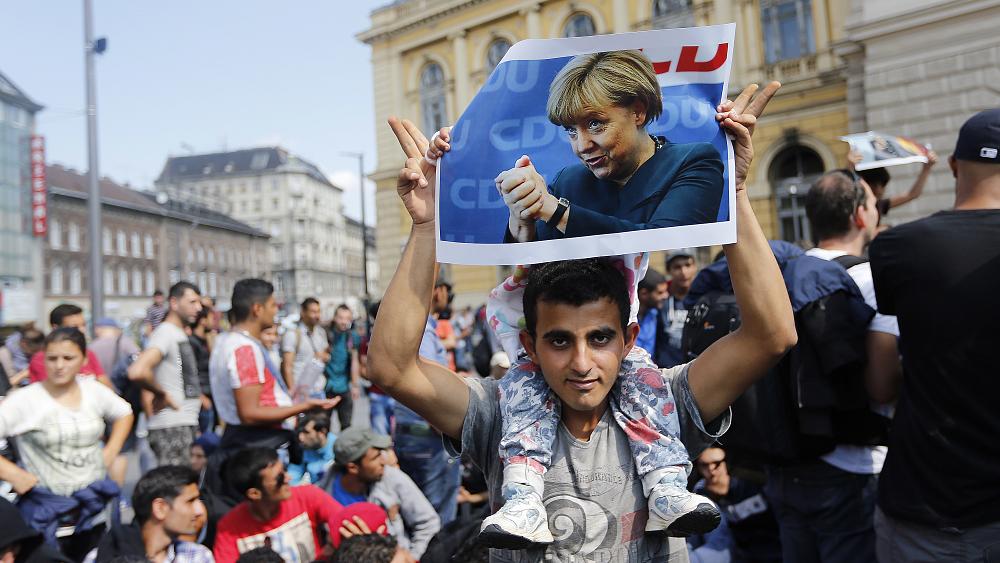 Merkel offers positive view of German handling of 2015 migrant crisis