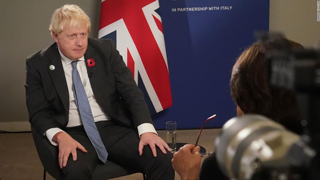 Boris Johnson talks up COP26 climate deals but stumbles on Attenborough mask controversy
