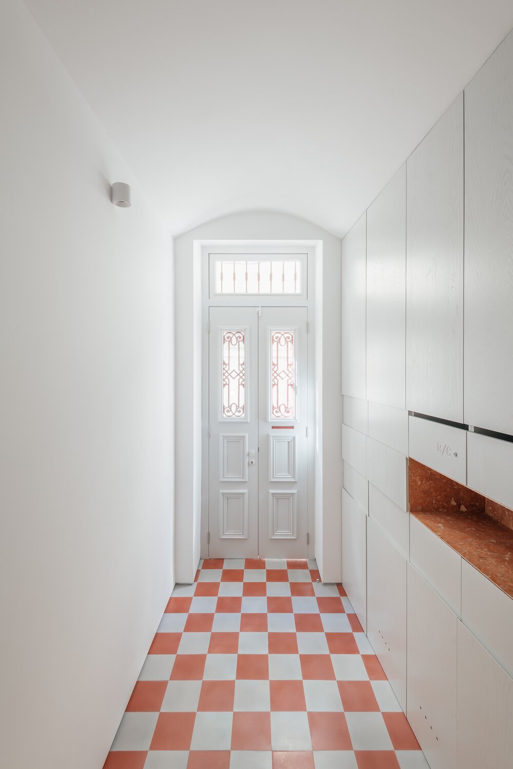 A Lisbon Apartment Building Is Brought Back to Life With Tidy, Light-Filled Interiors