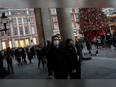 Omicron Threat Looms Over Christmas Holidays In Europe, US