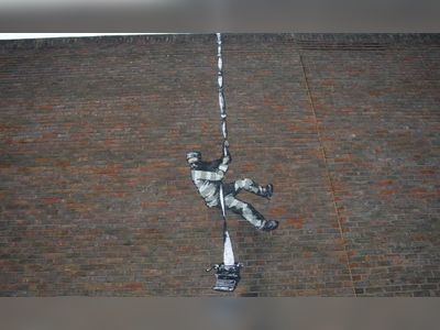 Banksy offers to raise £10m to buy Reading prison for art centre
