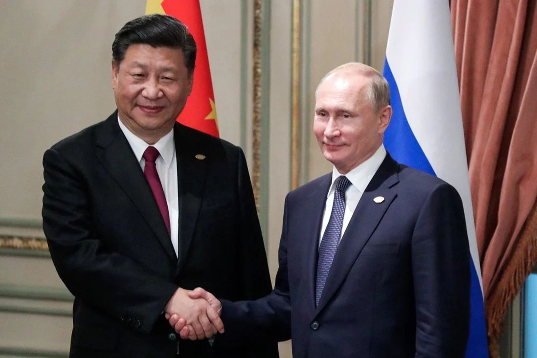As the West pushes them together, Xi and Putin show up for each other