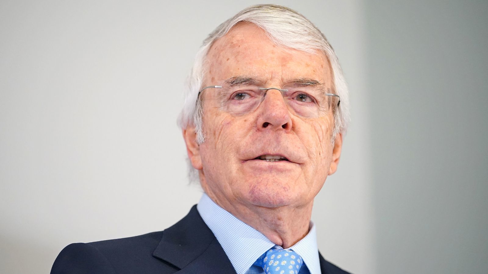 Johnson broke law over No 10 parties, says ex-PM Sir John Major