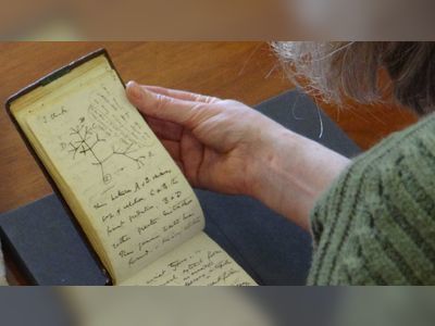 'Stolen' Charles Darwin notebooks left on library floor in pink gift bag