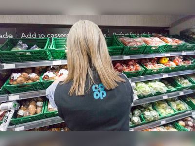 Co-op warns over food supplies and inflation at it reveals 57% profit fall