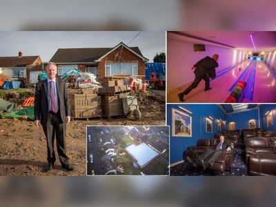 Millionaire 'buys land around him' to stop council tearing down man cave
