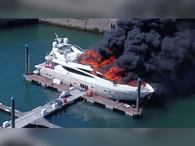 Superyacht sinks in Torquay harbour after large fire