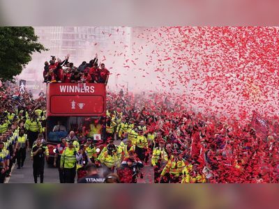 Liverpool turns red for double cup-winning parade