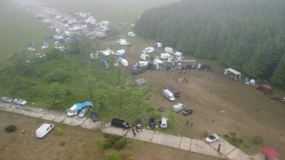 Several hundred remain at illegal rave site in Cornwall