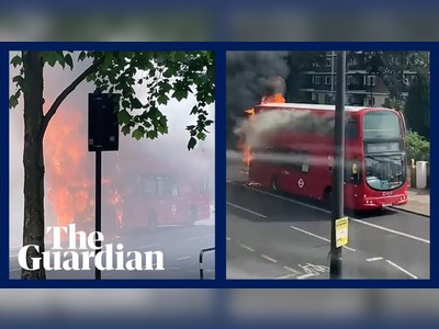 London bus bursts into flames in Brixton – video