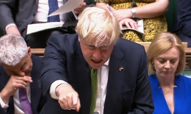 Boris Johnson defends record as government wins confidence vote