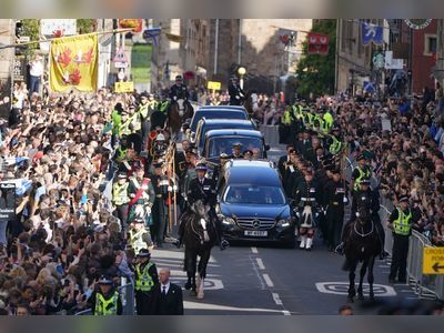 Thousands line Edinburgh's streets to see Queen's coffin
