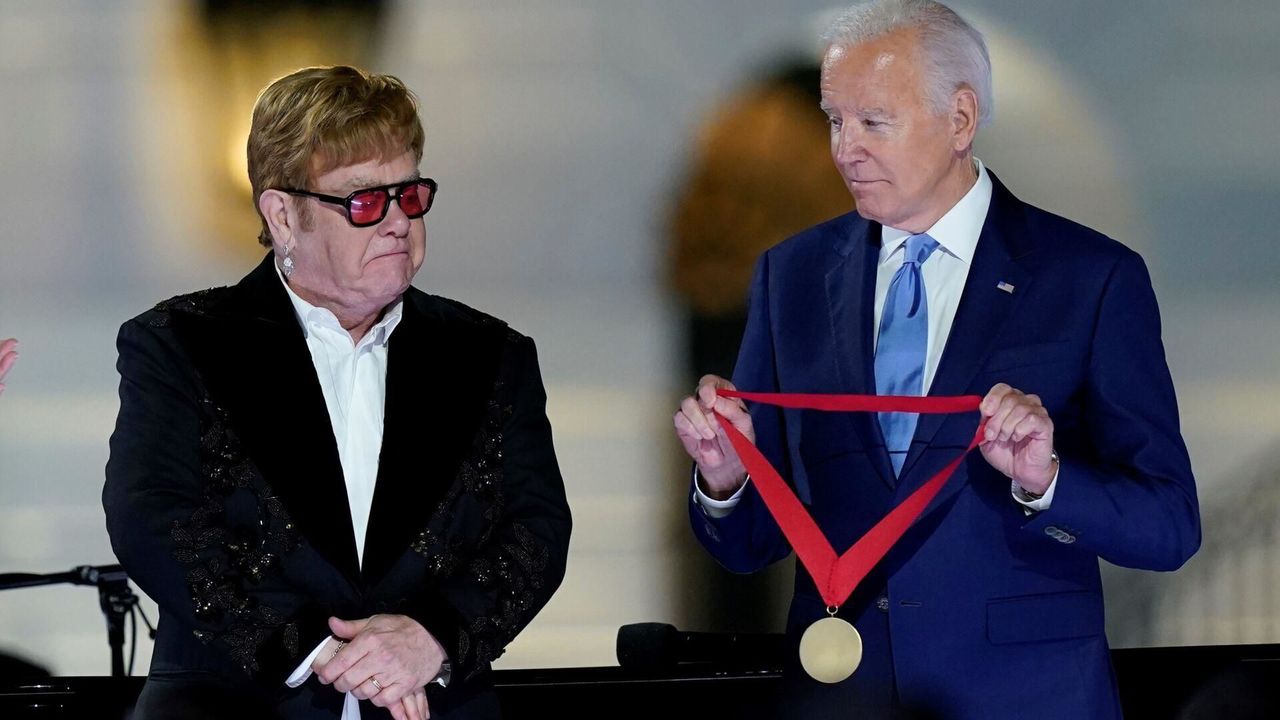 Award for Elton John after White House performance