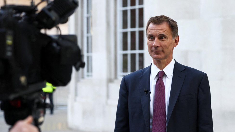 Chancellor warns of tax rises and squeeze on spending