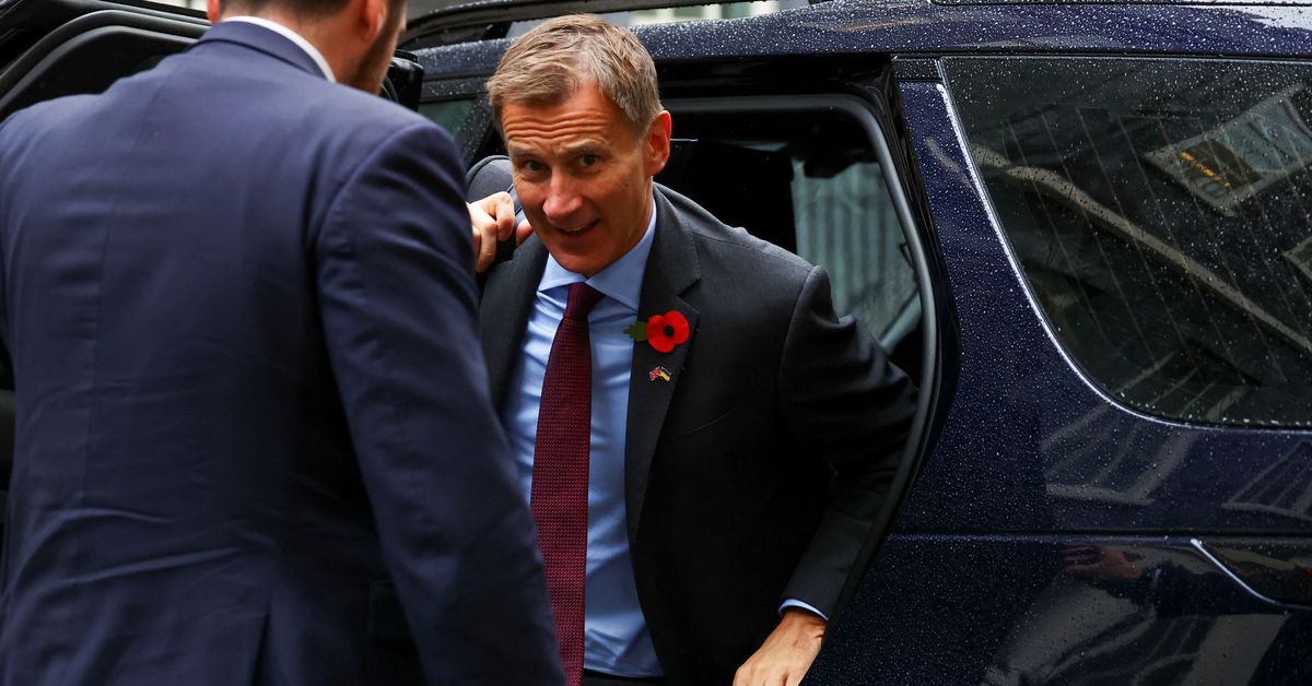 Jeremy Hunt set to outline 60 billion pounds in tax rises and spending cuts, the Guardian reports