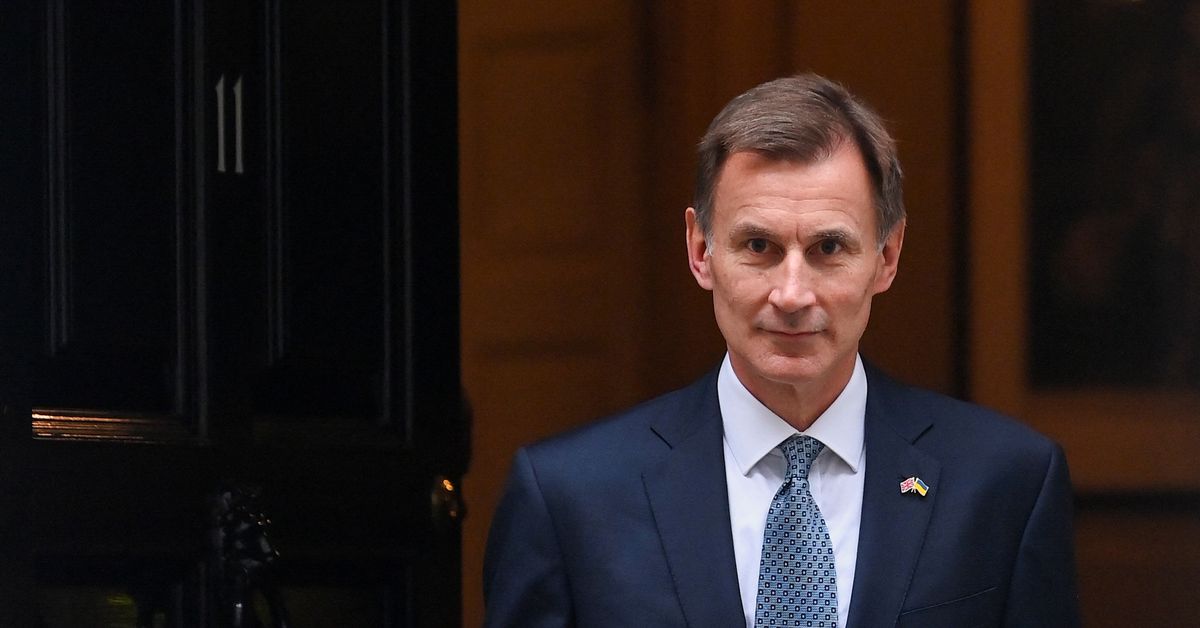 UK's Hunt, criticised by some Conservatives, defends tax hikes