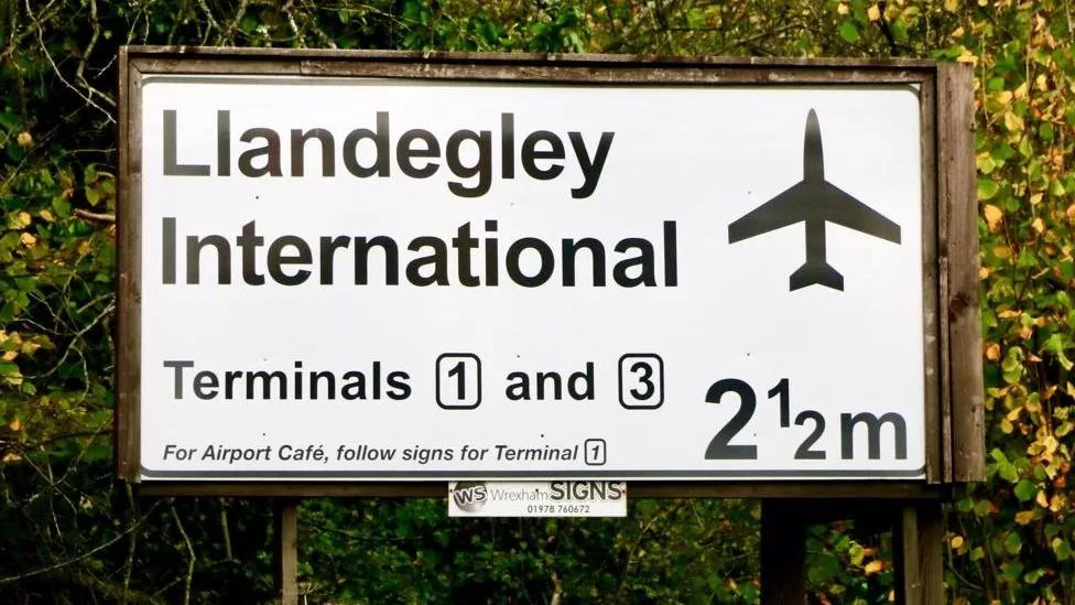 Man ends 20-year Llandegley airport sign joke that cost £25k