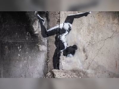 Banksy unveils Ukraine gymnast mural on building shelled by Russia