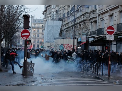 Violent protests after three shot dead in attack in central Paris